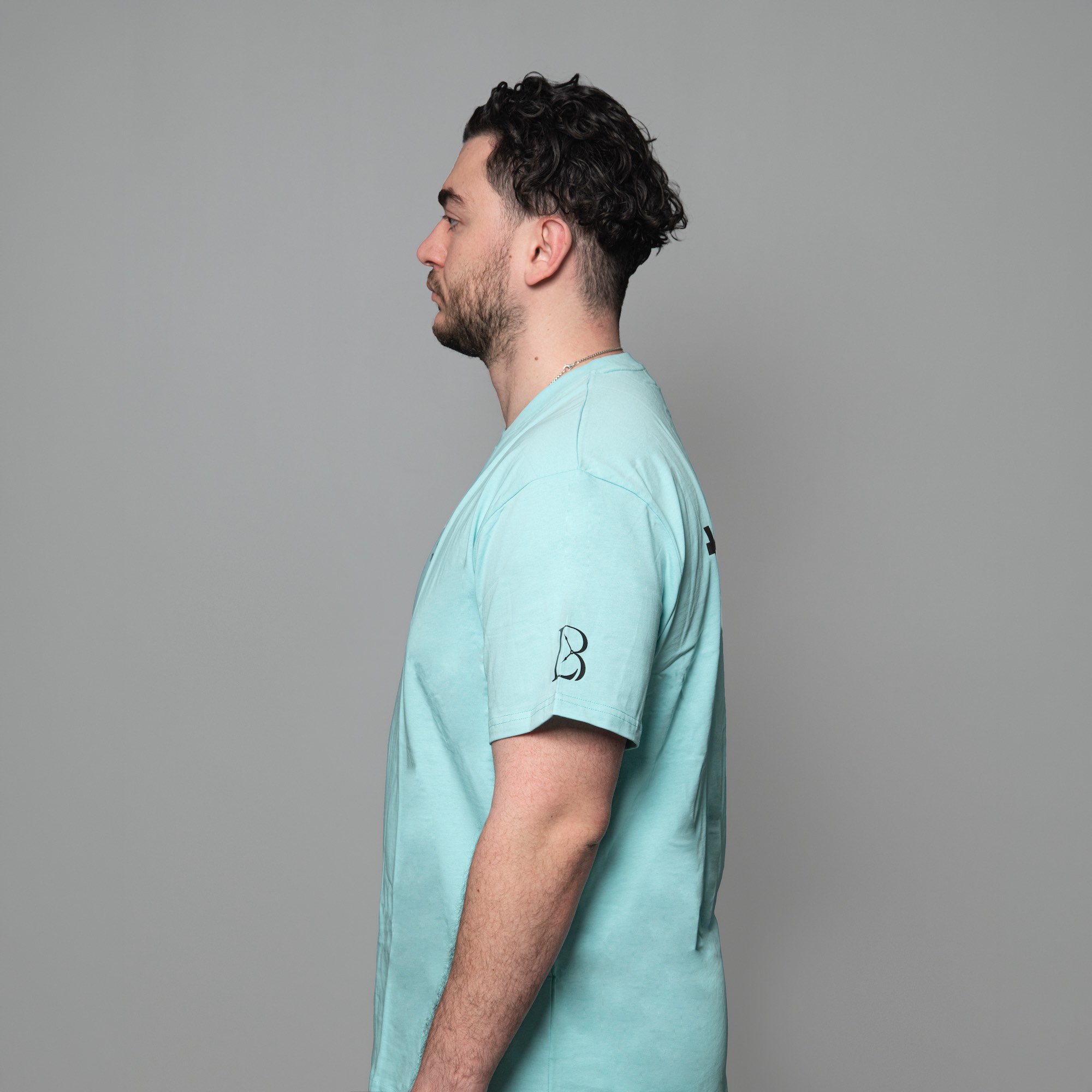 Luxury Bazaar Numbered Tiffany Blue "Unauthorized Dealer"® Crewneck T-Shirt (001-100) - Image 3